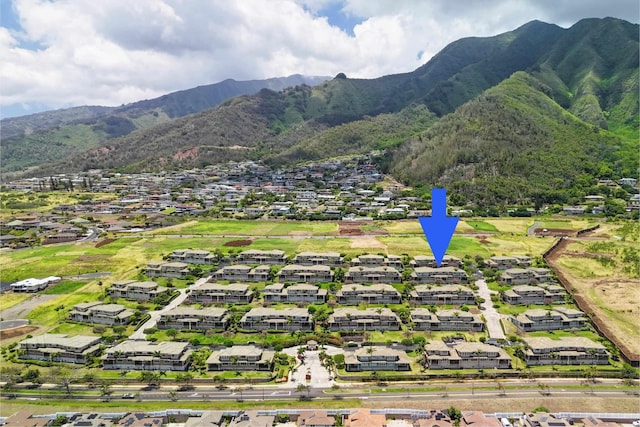 drone / aerial view with a residential view and a mountain view