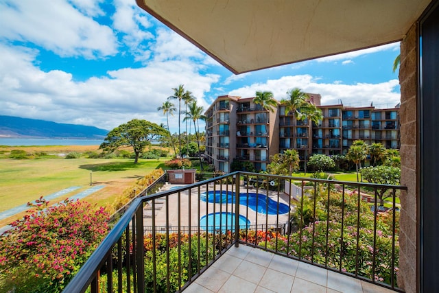 balcony featuring a mountain view