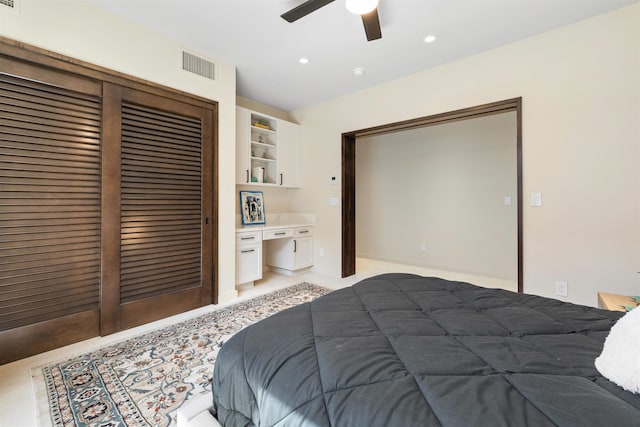 bedroom featuring ceiling fan and a closet