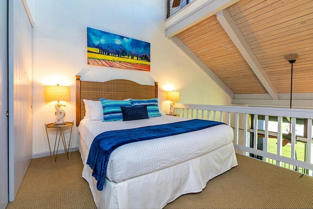 bedroom featuring vaulted ceiling with beams, carpet floors, and wooden ceiling