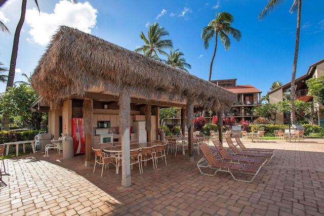 view of property's community featuring a patio area