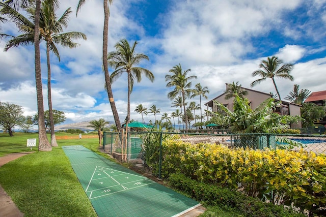 surrounding community featuring a lawn