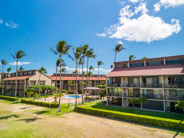 view of community featuring a lawn