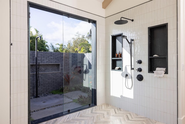 bathroom with a shower and vaulted ceiling