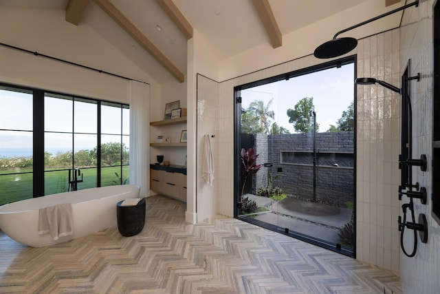 doorway to outside with vaulted ceiling with beams