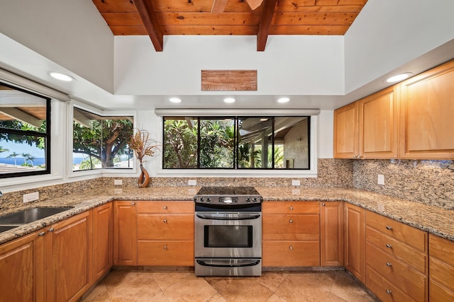 kitchen with beam ceiling, light stone countertops, sink, wooden ceiling, and stainless steel range with electric stovetop