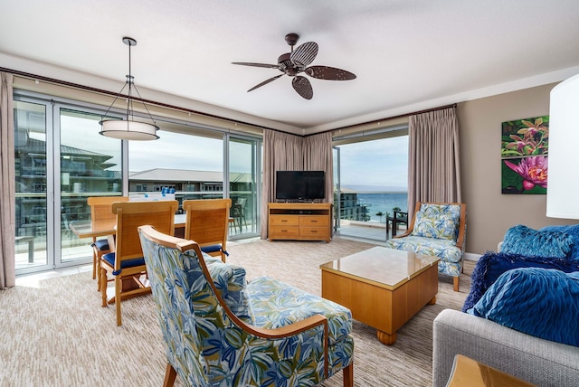 living room featuring ceiling fan and light carpet