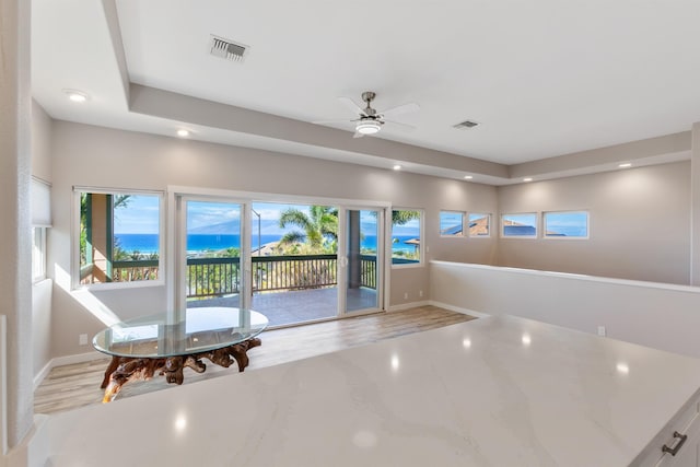 interior space featuring ceiling fan