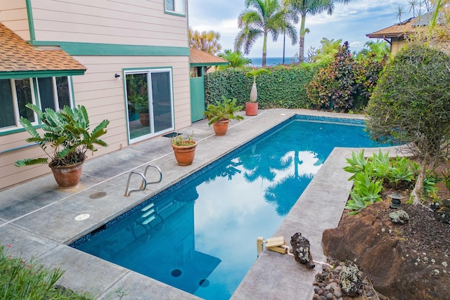 view of swimming pool with a patio