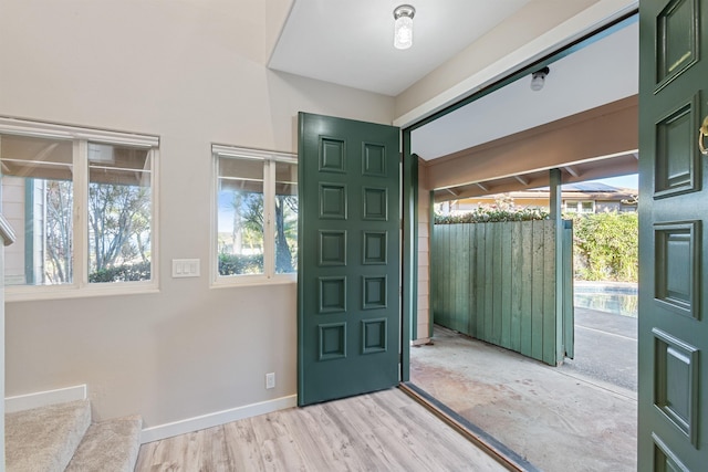 foyer with light hardwood / wood-style flooring