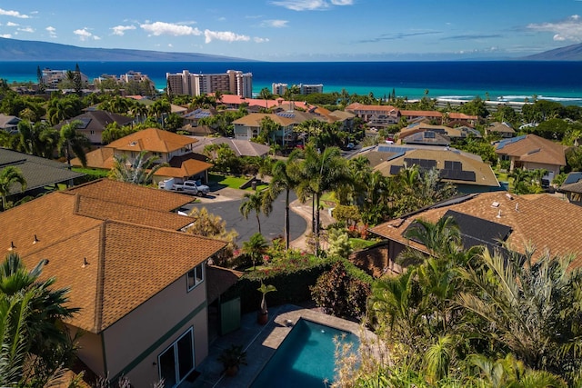 drone / aerial view with a water view