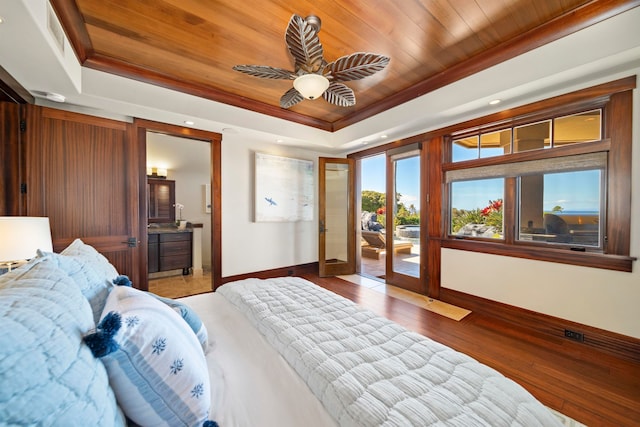 bedroom with access to outside, a raised ceiling, ceiling fan, and light wood-type flooring