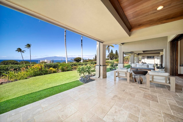 view of patio / terrace featuring outdoor lounge area and a mountain view