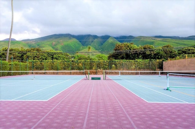 7146 Kamehameha V Hwy Unit 207C, Kaunakakai, HI 96748 - view of tennis court featuring community basketball court and a mountain view