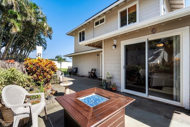 view of patio / terrace featuring a fire pit