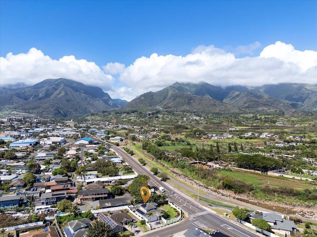 drone / aerial view featuring a mountain view