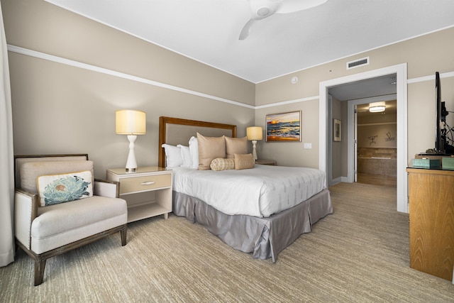 carpeted bedroom with ceiling fan