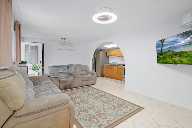 tiled living room with ornamental molding and sink