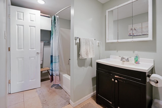 bathroom featuring shower / tub combo with curtain, vanity, and tile patterned flooring