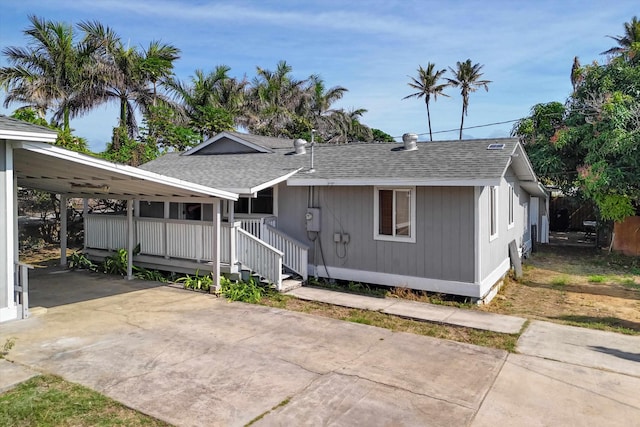 exterior space featuring a carport