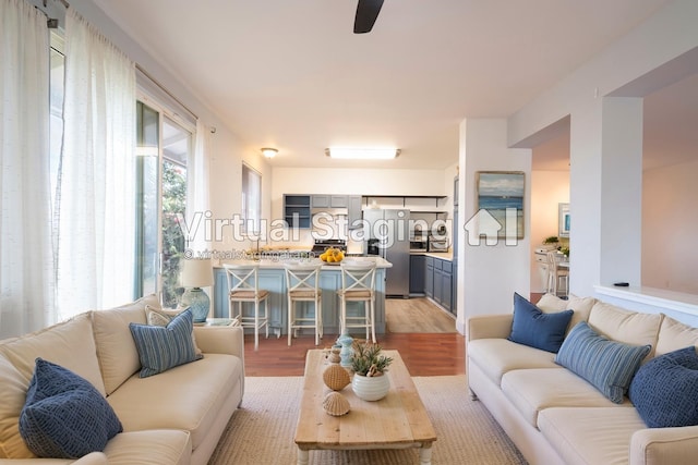 living area with light wood-style flooring