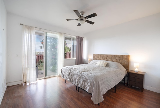 bedroom featuring a ceiling fan, access to outside, baseboards, and wood finished floors