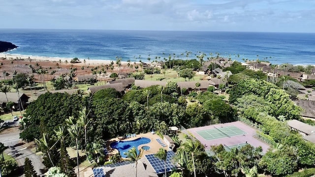 drone / aerial view with a water view and a view of the beach