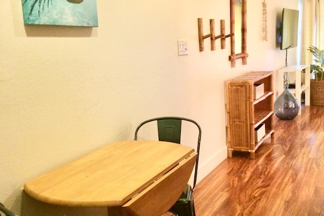 dining room featuring hardwood / wood-style flooring