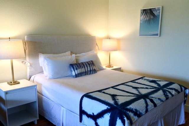 bedroom featuring dark hardwood / wood-style floors