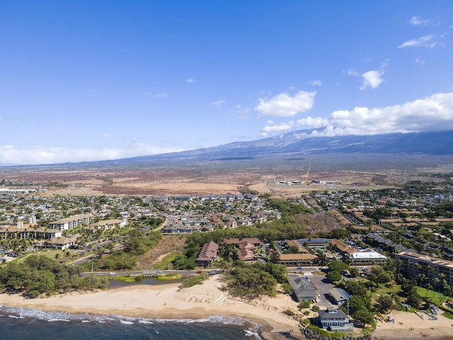 birds eye view of property featuring a water and mountain view