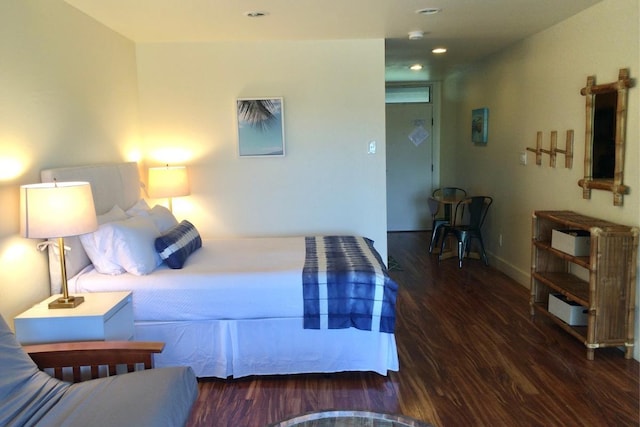 bedroom featuring dark hardwood / wood-style floors