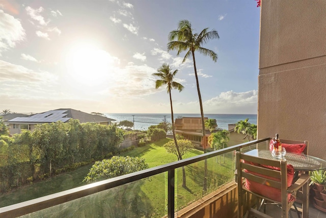 balcony featuring a water view