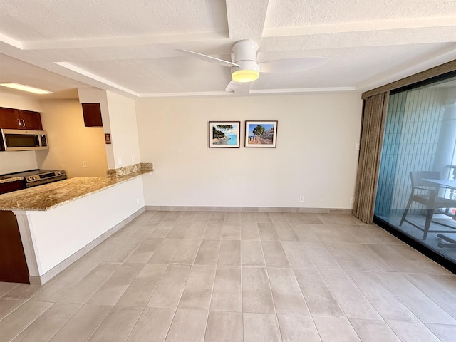 475 Front St Unit 308, Lahaina, HI 96761 - kitchen featuring stainless steel appliances, a textured ceiling, a ceiling fan, light stone counters, and a peninsula