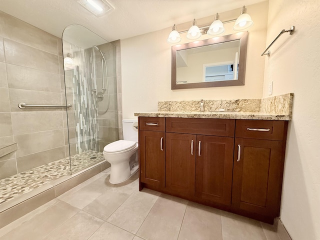475 Front St Unit 308, Lahaina, HI 96761 - bathroom with toilet, a shower stall, vanity, and tile patterned flooring
