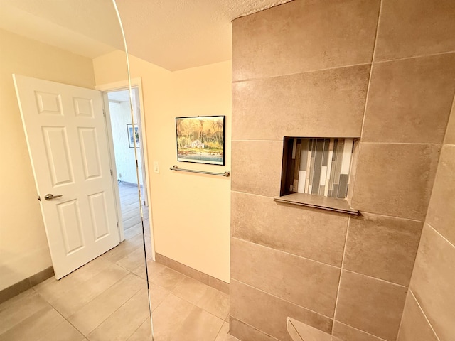 475 Front St Unit 308, Lahaina, HI 96761 - hall with baseboards and light tile patterned floors