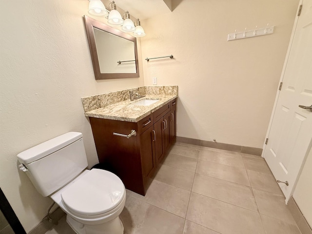 475 Front St Unit 308, Lahaina, HI 96761 - half bath with toilet, vanity, tile patterned floors, and baseboards