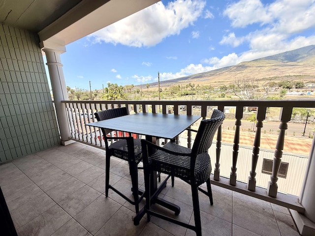 475 Front St Unit 308, Lahaina, HI 96761 - balcony featuring a mountain view and outdoor dining space