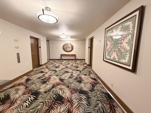 475 Front St Unit 308, Lahaina, HI 96761 - corridor featuring elevator and carpet flooring