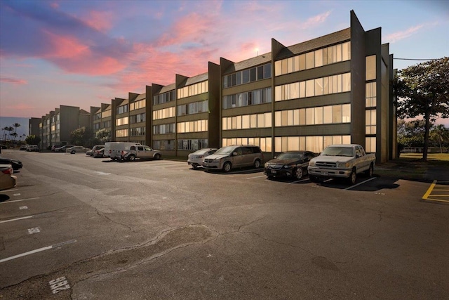 view of outdoor building at dusk