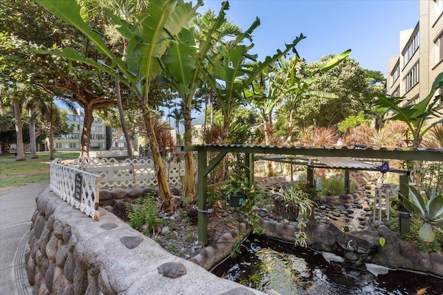 exterior space featuring a small pond