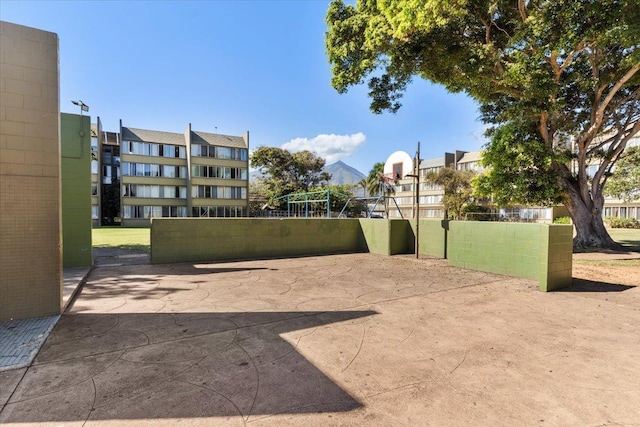 view of patio featuring basketball court