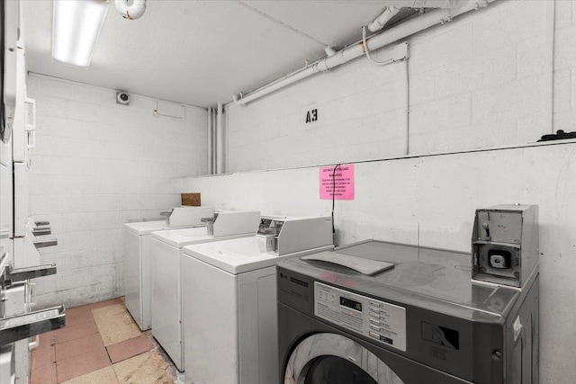 washroom with washer and clothes dryer