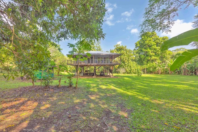 view of yard featuring a deck