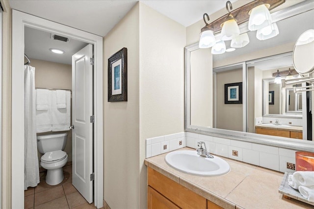 4327 Lower Honoapiilani Rd Unit 802, Lahaina, HI 96761 - full bath featuring toilet, vanity, tile patterned flooring, and tasteful backsplash