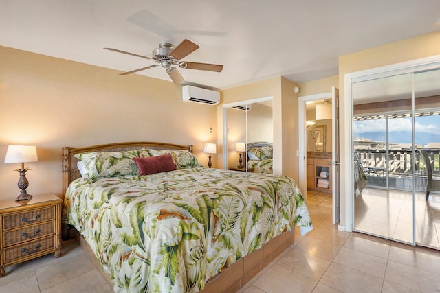 bedroom featuring access to exterior, ceiling fan, connected bathroom, a wall unit AC, and light tile patterned flooring