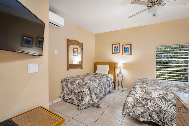 tiled bedroom with a wall mounted air conditioner and ceiling fan