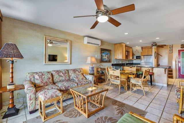 living room featuring light tile patterned flooring and an AC wall unit