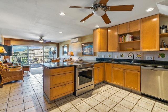 kitchen featuring kitchen peninsula, appliances with stainless steel finishes, sink, light tile patterned floors, and an AC wall unit