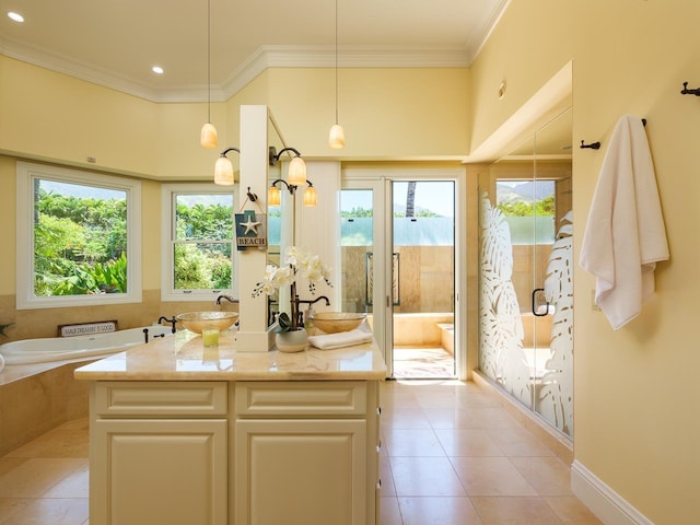 bathroom featuring a tub to relax in, tile patterned flooring, vanity, and ornamental molding