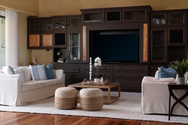 living room with dark hardwood / wood-style flooring